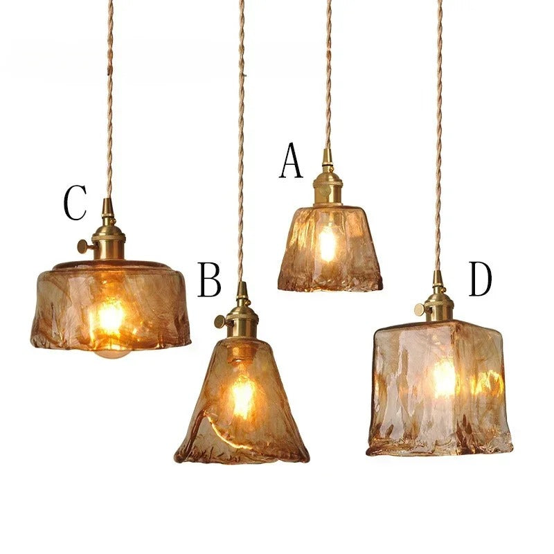 Les quatre formes A, B, C et D de la suspension en verre ambré